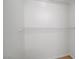 A bright, walk-in closet with white walls and wire shelving for optimal storage at 900 Heavenly Hills Ct # 114, Las Vegas, NV 89145