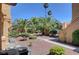 Relaxing courtyard with palm trees and walking paths in a beautiful neighborhood setting at 900 Heavenly Hills Ct # 114, Las Vegas, NV 89145