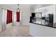 Bright dining area with a chandelier next to the kitchen at 900 Heavenly Hills Ct # 114, Las Vegas, NV 89145