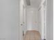 Hallway with white doors and neutral tile flooring at 900 Heavenly Hills Ct # 114, Las Vegas, NV 89145