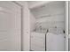 Efficient laundry room setup with modern washer and dryer units at 900 Heavenly Hills Ct # 114, Las Vegas, NV 89145