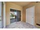 Enclosed tiled patio with sliding door and storage closet at 900 Heavenly Hills Ct # 114, Las Vegas, NV 89145
