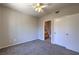 Neutral bedroom with carpet, access to bathroom, closet and neutral paint at 9050 W Warm Springs Rd # 2062, Las Vegas, NV 89148