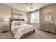 Comfortable bedroom features a window for natural light, neutral paint, and soft carpet at 9050 W Warm Springs Rd # 2062, Las Vegas, NV 89148