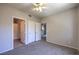Bedroom with carpet, neutral paint, closets and access to other parts of the house at 9050 W Warm Springs Rd # 2062, Las Vegas, NV 89148