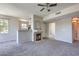 Spacious living room with a fireplace and an open layout to the kitchen at 9050 W Warm Springs Rd # 2062, Las Vegas, NV 89148