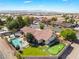 Beautiful single-Gathering home with a pool, putting green, covered patio, and lush landscaping in a quiet neighborhood at 9385 Mohawk St, Las Vegas, NV 89139