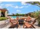Inviting backyard with pool, spa, fire pit, and comfortable seating area perfect for entertaining at 9385 Mohawk St, Las Vegas, NV 89139