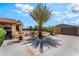 Inviting backyard featuring a pool, mature palm tree, patio area, and barbecue at 9385 Mohawk St, Las Vegas, NV 89139