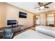 Spacious bedroom featuring wood floors, desk, and closet at 9385 Mohawk St, Las Vegas, NV 89139