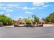 Charming home featuring mature trees, well-maintained landscaping, and a three-car garage at 9385 Mohawk St, Las Vegas, NV 89139