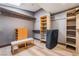 Walk-in closet with custom shelves and drawers for optimal storage and organization at 9385 Mohawk St, Las Vegas, NV 89139