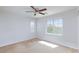 Bright, carpeted bedroom with two windows providing natural light and a comfortable atmosphere at 9814 Gifthouse St, Las Vegas, NV 89178