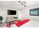 Spacious bedroom with modern decor, a large TV, and a comfortable sofa at , Las Vegas, NV 89101
