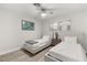 Bedroom featuring two beds, wood-look flooring, window and two end tables at , Las Vegas, NV 89101