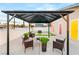 Gazebo with modern courtyard featuring seating area, turf squares, and colorful exterior doors at , Las Vegas, NV 89101