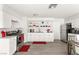 Bright kitchen features white cabinets, stainless steel appliances, and open shelving at , Las Vegas, NV 89101