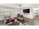 Inviting living room with a large sectional, a ceiling fan, and lots of light at , Las Vegas, NV 89101