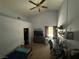 Bedroom features a ceiling fan, desk, and comfortable bed at , Las Vegas, NV 89145