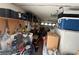 Cluttered garage with storage shelves, tools, and a bicycle at , Las Vegas, NV 89145