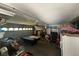 Cluttered garage with a pool table and other miscellaneous items at , Las Vegas, NV 89145