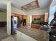 Well-lit kitchen featuring granite countertops, stainless steel appliances, and wooden cabinets at , Las Vegas, NV 89145