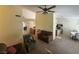 Bright living room featuring neutral tones, ceiling fan, and an open layout to the kitchen at , Las Vegas, NV 89145