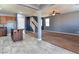 Spacious layout joining the kitchen, dining area, and living room with easy access to staircase at 1012 Water Cove St, Henderson, NV 89011