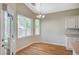 Bright breakfast nook with windows and a door leading to the backyard at 10198 Timber Willow Ave, Las Vegas, NV 89135