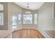 Cozy dining area with large windows, letting in plenty of light and views to the outdoors at 10198 Timber Willow Ave, Las Vegas, NV 89135