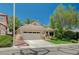 Charming single-story home with a well-manicured front yard and a two-car garage in a quiet neighborhood at 10198 Timber Willow Ave, Las Vegas, NV 89135