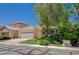Charming single-story home with a well-manicured front yard and a two-car garage in a quiet neighborhood at 10198 Timber Willow Ave, Las Vegas, NV 89135