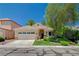 Charming single-story home with a well-manicured front yard and a two-car garage in a quiet neighborhood at 10198 Timber Willow Ave, Las Vegas, NV 89135