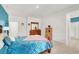 Bright bedroom with large window, dresser, and carpet flooring at 10904 Ellis Pointe Ave, Las Vegas, NV 89166