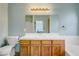 Classic bathroom featuring tile countertop and a bathtub/shower combo at 117 Lotus Blossom Ct, Las Vegas, NV 89145