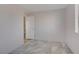 A clean, light-filled bedroom features modern flooring and a neutral color palette at 117 Lotus Blossom Ct, Las Vegas, NV 89145
