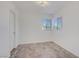 Bright bedroom with marble flooring, large window, and a closet at 117 Lotus Blossom Ct, Las Vegas, NV 89145