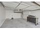 Spacious two car garage with ample lighting and an abundance of storage at 117 Lotus Blossom Ct, Las Vegas, NV 89145