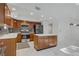 Modern kitchen with stainless steel appliances, updated cabinets, backsplash, and island, perfect for cooking and entertaining at 117 Lotus Blossom Ct, Las Vegas, NV 89145