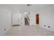 Bright living room with marble floors, open layout, with stairs to second floor at 117 Lotus Blossom Ct, Las Vegas, NV 89145