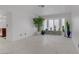 Bright living room with marble floors, a bay window with decorative tile, and an open layout at 117 Lotus Blossom Ct, Las Vegas, NV 89145
