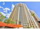 Exterior shot of a high-rise building with multiple floors and balconies at 135 E Harmon Ave # 2116, Las Vegas, NV 89109