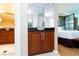 A small bar area sits just outside the bright bedroom, adding convenience and style at 135 E Harmon Ave # 2116, Las Vegas, NV 89109