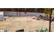 Spacious backyard showing desert landscaping and a block wall at 1886 Ludington Ave, Las Vegas, NV 89156