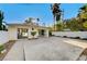 Large backyard patio with mature trees providing privacy and shade at 1905 Plaza Del Padre, Las Vegas, NV 89102