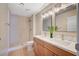 Bathroom features a double sink vanity and a walk-in shower at 1905 Plaza Del Padre, Las Vegas, NV 89102