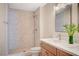 Updated bathroom featuring a stone shower and double sinks at 1905 Plaza Del Padre, Las Vegas, NV 89102