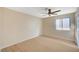 Bright bedroom featuring a ceiling fan, wood-look floors, and neutral paint at 1905 Plaza Del Padre, Las Vegas, NV 89102