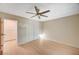 Bedroom featuring a modern ceiling fan, built in storage, wood-look floors, and neutral paint at 1905 Plaza Del Padre, Las Vegas, NV 89102