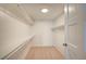 Walk-in closet features modern wood floors and ample storage space at 1905 Plaza Del Padre, Las Vegas, NV 89102